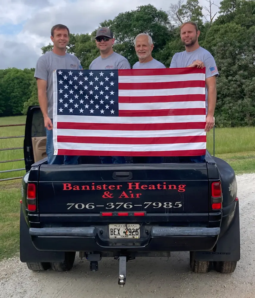 banister-crew-in-truck-with-flag-2